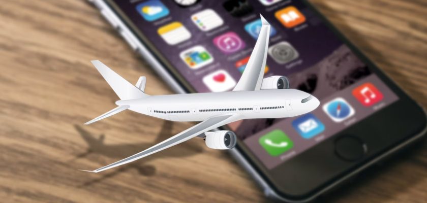 من iPhoneIslam.com، هاتف iPhone به طائرة تحمل طابع السفر في الأعلى.