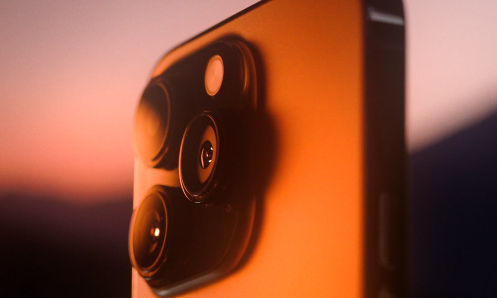 From iPhoneIslam.com, a close-up of the iPhone 11 at sunset.