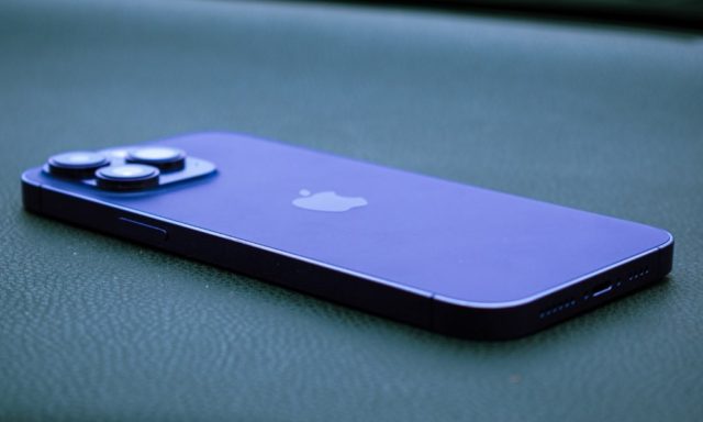 From iPhoneIslam.com, a blue iPhone sitting on a leather seat, 5 rumors expected in the iPhone 15 series.