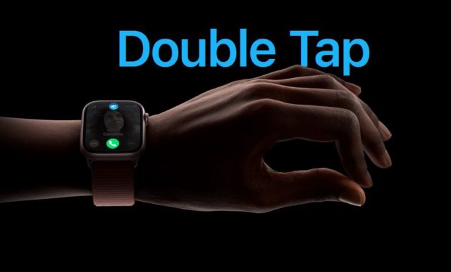 来自 iPhoneIslam.com，一个人拿着一块 Apple Watch Series 9，上面显示着“双击”字样。