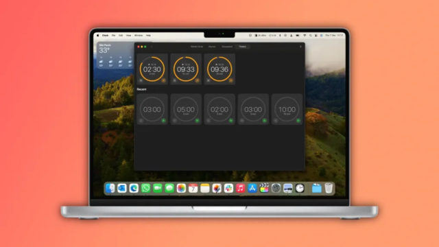 من iPhoneIslam.com، جهاز Macbook مزود بساعة على الشاشة تعمل بنظام التشغيل macOS Sonoma.