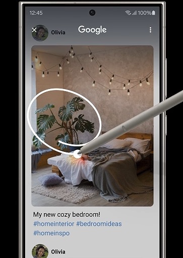 من iPhoneIslam.com، هاتف ذكي بقلم يشير إلى صورة غرفة.