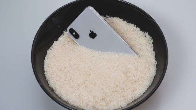 From iPhoneIslam.com, iPhone in a bowl of rice.