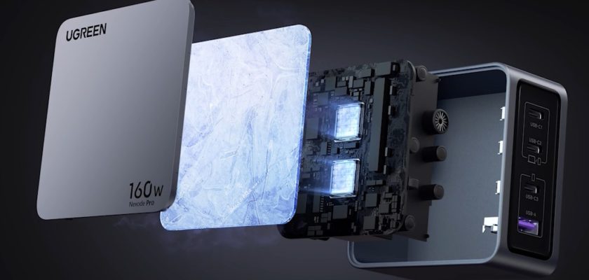 iPhoneIslam.com سے، Ugreen 160W چارجر کا ایک تفصیلی منظر جس میں اندرونی اجزاء اور بیرونی باکس دکھایا گیا ہے۔