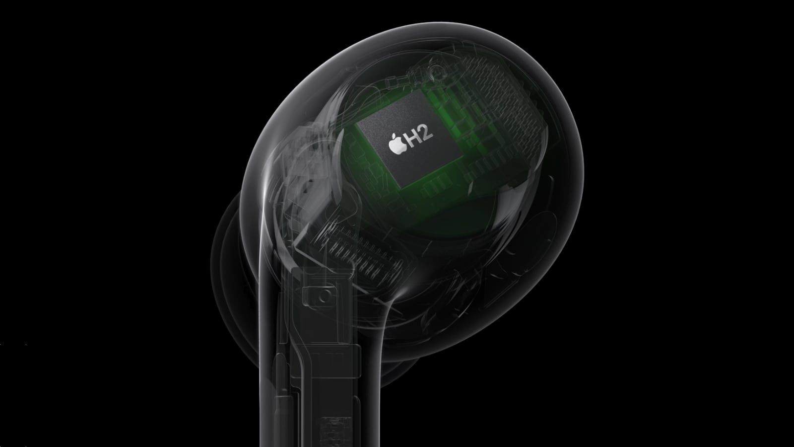 From iPhoneIslam.com The transparent AirPods 4 reveal a subtle green internal chip bearing the Apple logo, against a black background.