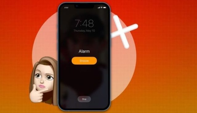 من iPhoneIslam.com، هاتف ذكي يعرض منبهًا للغفوة عند الساعة 7:48 صباحًا على خلفية تمزج بين اللون البرتقالي والأحمر، مع وجه امرأة كرتونية يُظهر تعبير تفكير على اليسار.