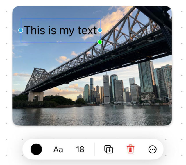 من iPhoneIslam.com، يمتد جسر كبير فوق نهر ويظهر في الخلفية أفق مدينة مليء بالمباني الشاهقة. النص الموجود على الصورة يقول: "هذا هو النص الخاص بي.