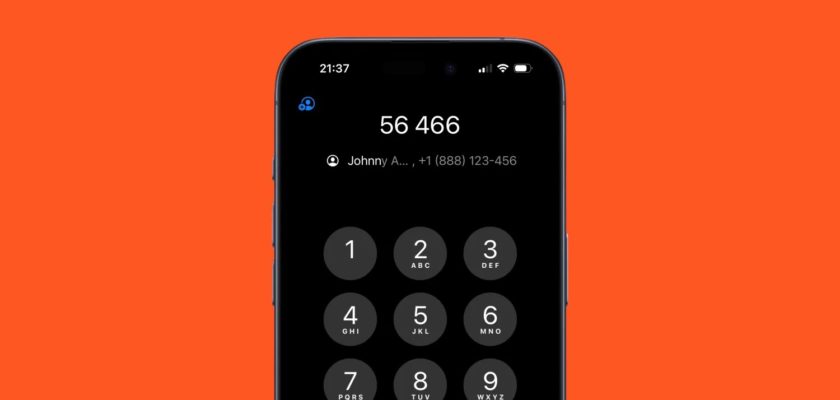 من iPhoneIslam.com، شاشة هاتف ذكي أنيقة تعرض مكالمة واردة من "Johnny A." على الرقم "+1 (888) 123-456". الشاشة سوداء مع خلفية برتقالية غامقة، تعرض أحدث ميزات iOS 18.