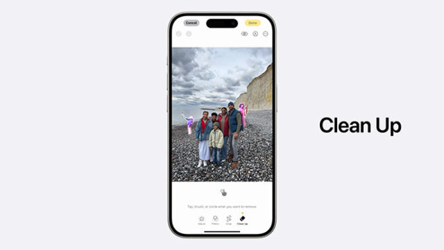 من iPhoneIslam.com، شاشة هاتف ذكي تعرض تطبيقًا لتحرير الصور. تُظهر الصورة التي يتم تحريرها عائلة على شاطئ صخري به منحدرات. يسلط التطبيق الضوء على أجزاء الصورة المراد إزالتها. نص يقرأ "تنظيف".