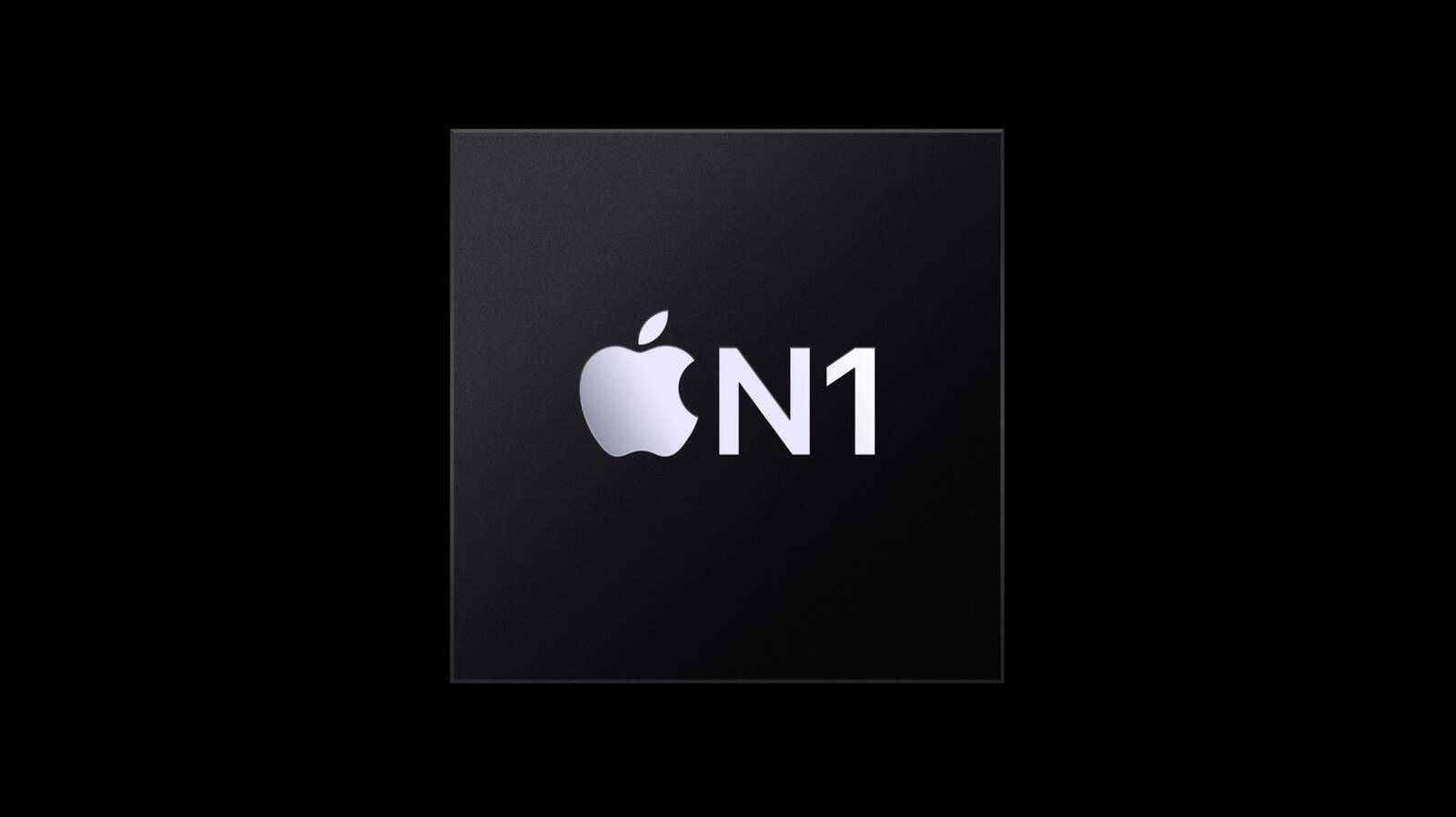 من موقع فون إسلام: مربع أسود يحمل شعار Apple والنص "N1" باللون الأبيض، يتوسطه مربع أسود على خلفية سوداء، ويمثل شريحة Apple N1.