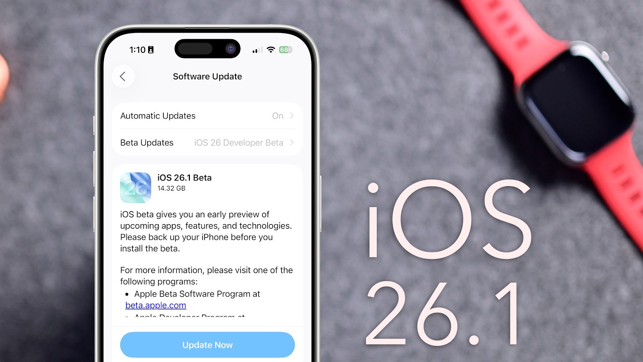 من موقع فون إسلام: يعرض جهاز آيفون شاشة تحديث iOS 26.1 Beta، مع ساعة آبل وسوار أحمر موضوعين بجانبها على سطح رمادي اللون - وهو ما يجعلها مثالية للمتابعة.