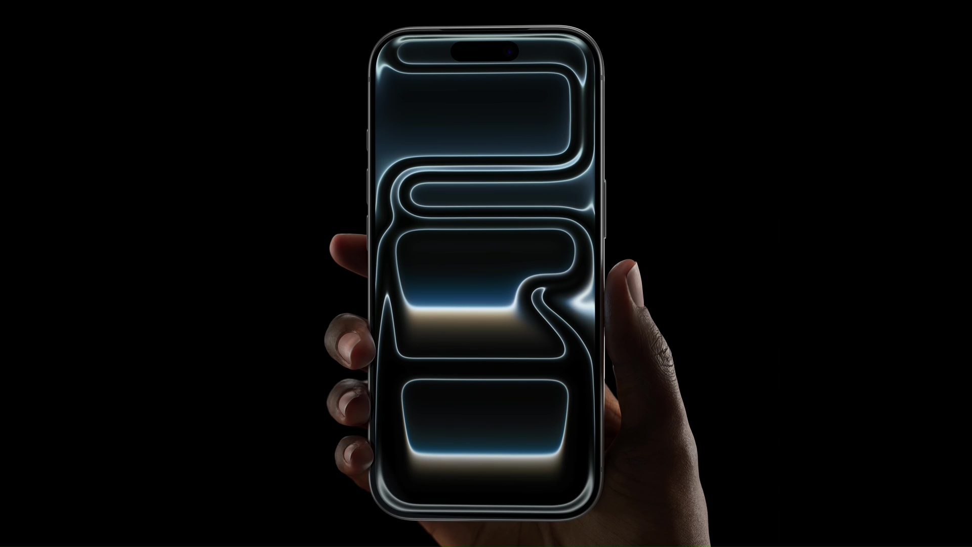 来自 iPhone Islam 网站：一只手拿着一台现代 iPhone 17 Pro 智能手机，黑色背景，屏幕上显示发光的抽象形状，展示最新 Pro 手机中的 iPhone 功能。