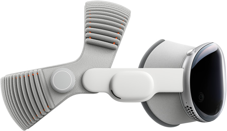 من موقع فون إسلام: سماعة رأس للواقع الافتراضي باللونين الأبيض والرمادي، مستوحاة من نظارة أبل في برغنو تتميز بحزام رأس قماشي قابل للتعديل ولوحة أمامية عاكسة.