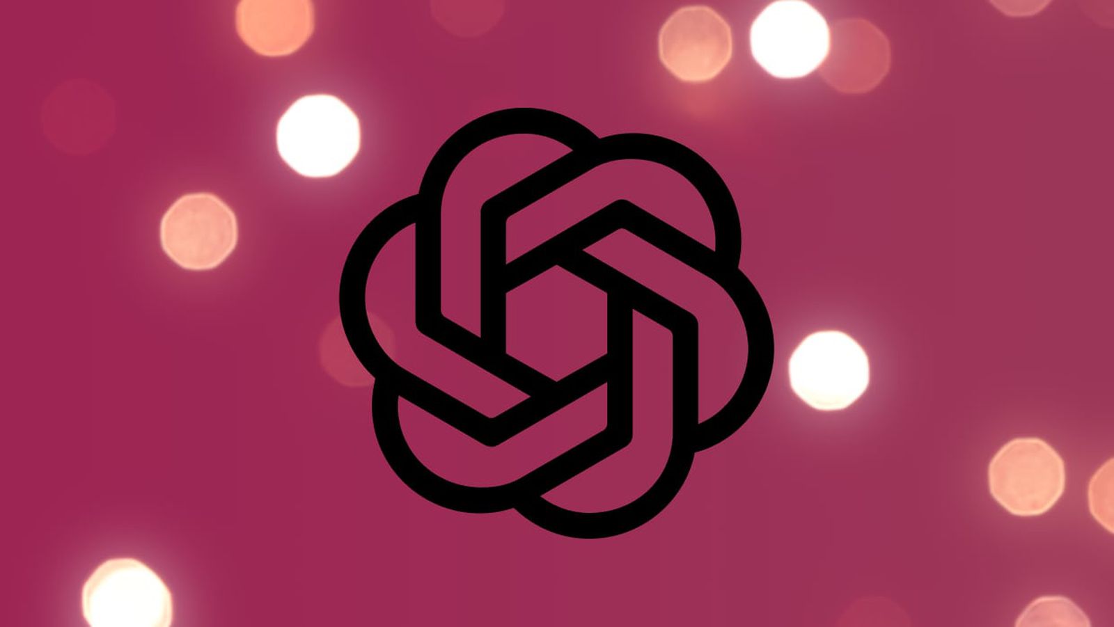 Mula sa PhoneIslam: Ang logo ng OpenAI ay isang itim na heometrikong disenyo na may logo ng OpenAI sa gitna sa isang kulay rosas na background na may iba't ibang malabong puting pabilog na ilaw, na nagtatampok ng mga balita sa teknolohiya at sumasalamin sa diwa ng linggo ng Disyembre 12-18.