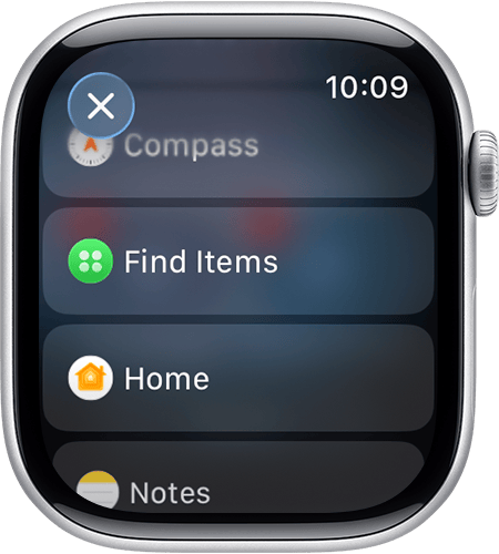 من موقع فون إسلام: شاشة Apple Watch Series 9 تعرض قائمة بالخيارات: البوصلة، والعثور على بطاقة تعريفية لـ AirTag، والصفحة الرئيسية، والملاحظات؛ الوقت المعروض هو 10:09.