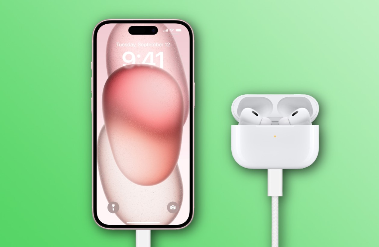 من موقع فون إسلام: هاتف آيفون بخلفية تجريدية وردية اللون يعمل بنظام iOS 26، وبجانبه زوج من سماعات AirPods في علبة شحن، وكلاهما على خلفية متدرجة خضراء.