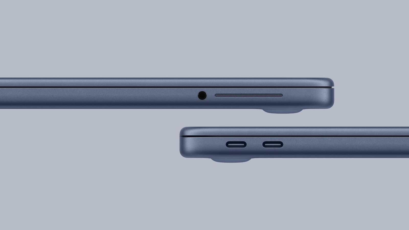 من موقع فون إسلام: منظر جانبي لجهازي كمبيوتر محمول أزرقين مغلقين يظهران المنافذ: أحدهما مزود بمقبس سماعة رأس وفتحة بطاقة SD، والآخر مزود بمنفذي USB-C، وكلاهما على خلفية رمادية فاتحة.