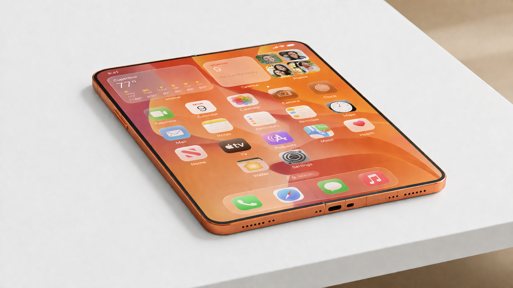 من موقع فون إسلام: هاتف ذكي قابل للطي باللون البرتقالي آي فون قابل للطي بشاشة كبيرة تعرض أيقونات تطبيقات متنوعة على سطح أبيض.