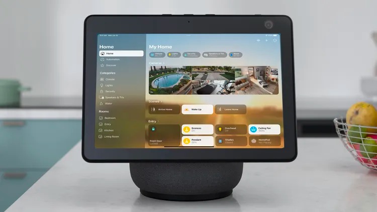 From the Phonegram website: A smart display on a kitchen counter shows a smart home control panel with controls for lights, screens, and other devices, seamlessly integrated with iOS 27.