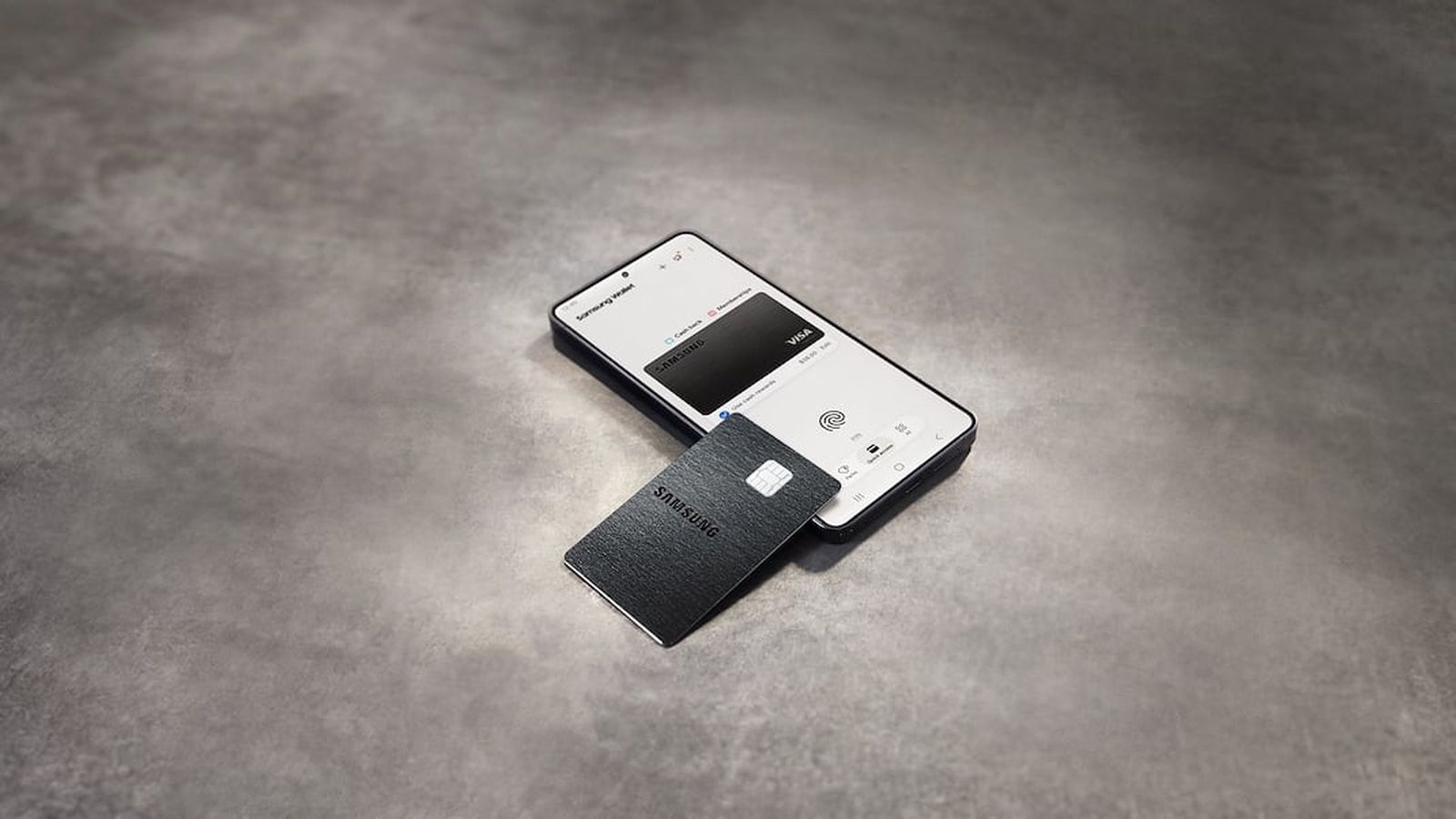 From the Phonegram website: A smartphone displaying a banking app placed on a gray surface, with a black credit card partially on top of it, as if the image captures a moment of following the week's financial news from the modern digital sidelines.
