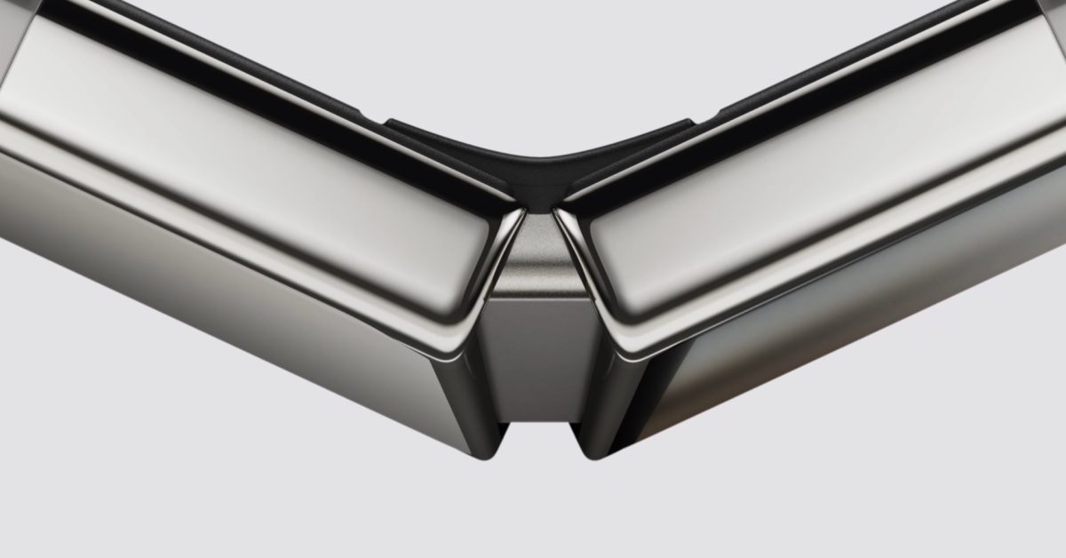 From the Phonegram website: A close-up shot of the hinge mechanism in a foldable smartphone while in a partially open position.