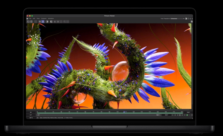 من موقع فون إسلام: شاشة جهاز MacBook Pro M6 تعرض واجهة برنامج رسوم متحركة ثلاثية الأبعاد تُظهر مخلوقًا عضويًّا سرياليًّا، ذو أشواك، باللونين الأرجواني والأخضر، على خلفية برتقالية.